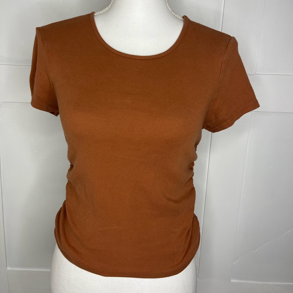 Brown cinched on the side T-shirt in the size large